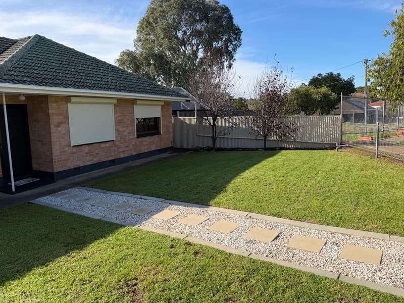 Tidy front yard and stepping-stone path after a maintenance visit in Valley View, Adelaide